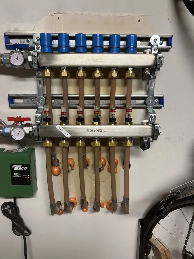 Plumber performing Water Heater Repair at a residential property in Mannford